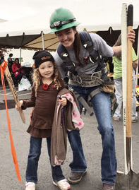 Amanda, Hoffman Construction laborer and her daughter at OTI's 2015 career fair