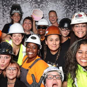 Women trades workers celebrating diverse careers in construction and skilled trades at Oregon Tradeswomen event.